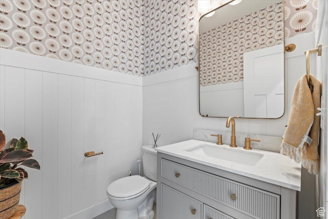 10262 N Yorkshire Cir, Highland, UT 84003 - half bath with vanity, wainscoting, and wallpapered walls