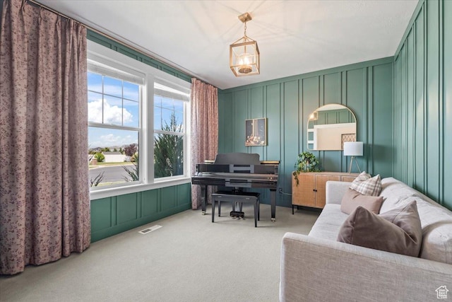 10262 N Yorkshire Cir, Highland, UT 84003 - living area with a decorative wall, healthy amount of natural light, and carpet floors