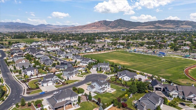 10262 N Yorkshire Cir, Highland, UT 84003 - aerial overview of property's location with a mountainous background and nearby suburban area