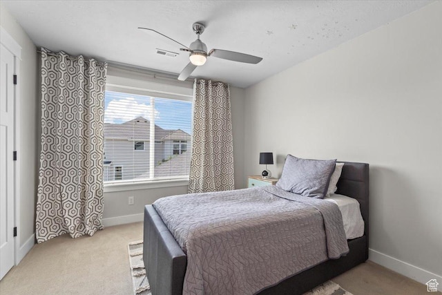 10262 N Yorkshire Cir, Highland, UT 84003 - bedroom with light carpet and ceiling fan