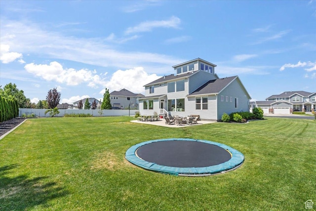 10262 N Yorkshire Cir, Highland, UT 84003 - back of property with a patio and a trampoline