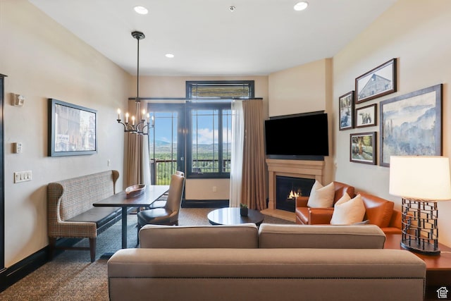 2100 W Frostwood Blvd Unit 5164, Park City, UT 84098 - carpeted living room featuring a lit fireplace, a chandelier, and recessed lighting