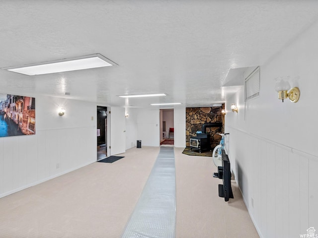 1034 E 1st St S, Ogden, UT 84404 - hall with a textured ceiling, carpet flooring, and wainscoting