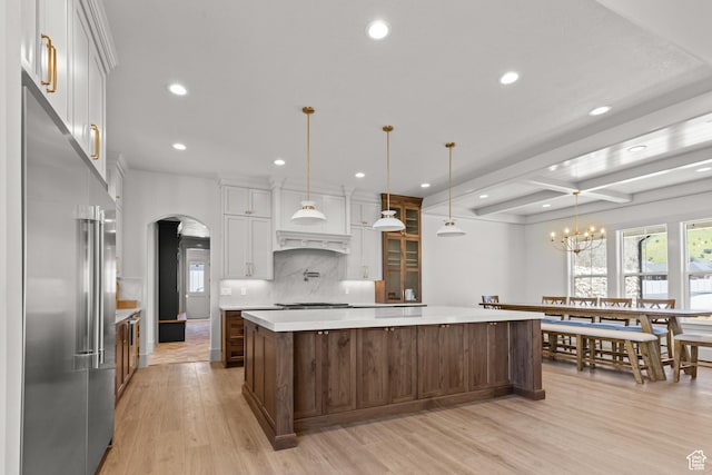 177 E 475 S, Mantua, UT 84324 - kitchen featuring appliances with stainless steel finishes, arched walkways, recessed lighting, light countertops, and a spacious island