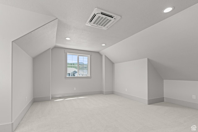 177 E 475 S, Mantua, UT 84324 - additional living space with a textured ceiling, vaulted ceiling, carpet floors, and recessed lighting