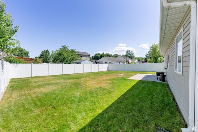 145 Teal Loop, Logan, UT 84321 - fenced backyard with a patio