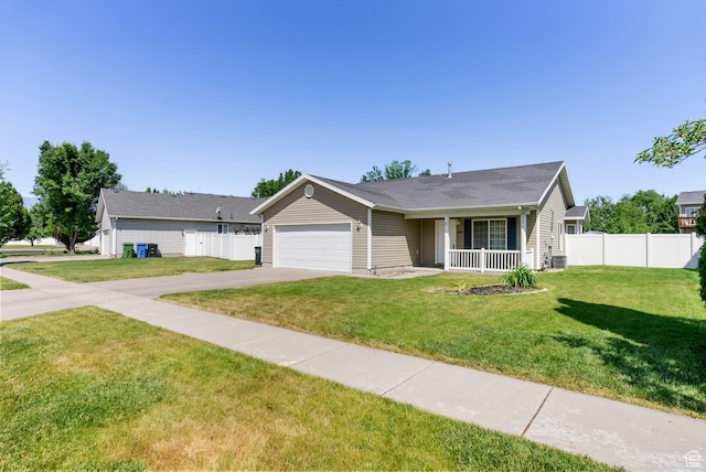 145 Teal Loop, Logan, UT 84321 - single story home featuring concrete driveway, an attached garage, and covered porch