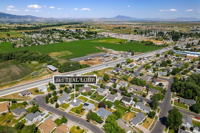 145 Teal Loop, Logan, UT 84321 - view of property location with a mountainous background and nearby suburban area