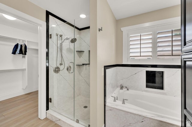 1788 N 925 E, North Ogden, UT 84414 - full bathroom with a bath, a marble finish shower, wood finished floors, and a spacious closet