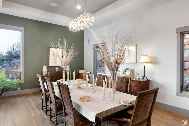 1310 Mellow Rd, Park City, UT 84060 - dining area with light wood-style floors, healthy amount of natural light, and a chandelier
