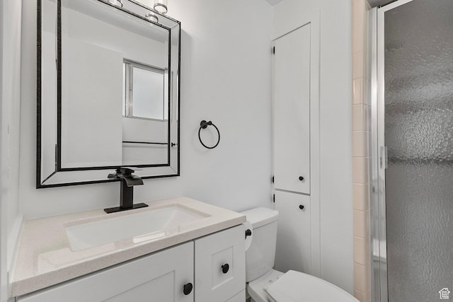 5600 S Ralph Dr, Taylorsville, UT 84129 - full bathroom with vanity and a shower with door