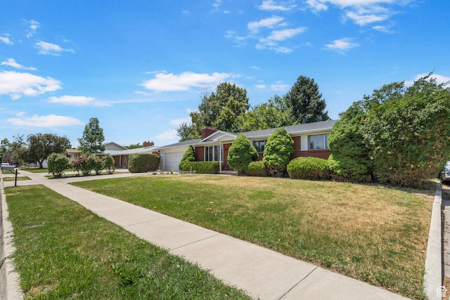 5600 S Ralph Dr, Taylorsville, UT 84129 - single story home with a garage, a front yard, and concrete driveway