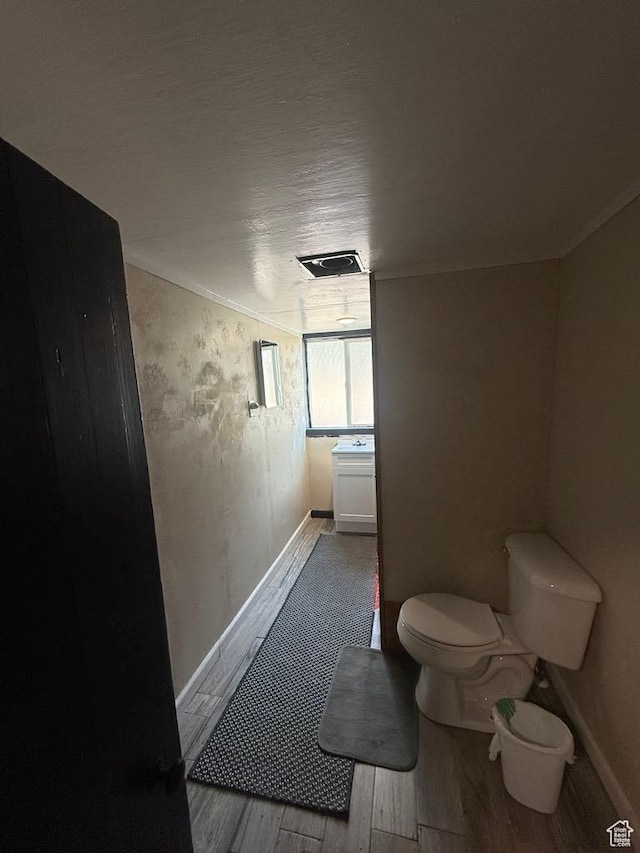 365 Hill St, Helper, UT 84526 - bathroom with wood finished floors and ornamental molding