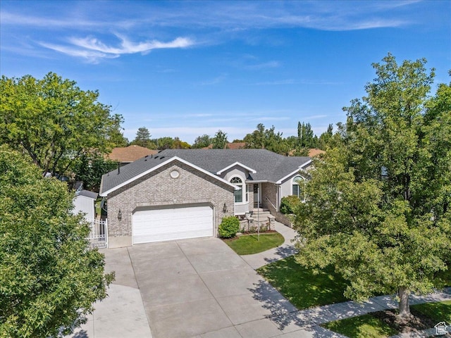 7258 S Mel Helen Way, West Jordan, UT 84084 - ranch-style house featuring brick siding, an attached garage, concrete driveway, and a gate