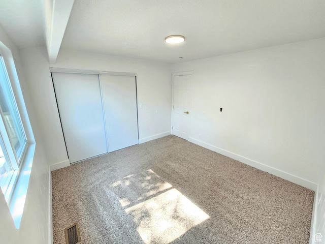 3797 S Armoridge Dr, Magna, UT 84044 - unfurnished bedroom featuring carpet flooring and a closet