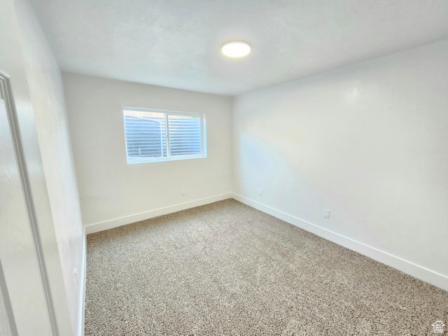 3797 S Armoridge Dr, Magna, UT 84044 - unfurnished room with baseboards and carpet flooring