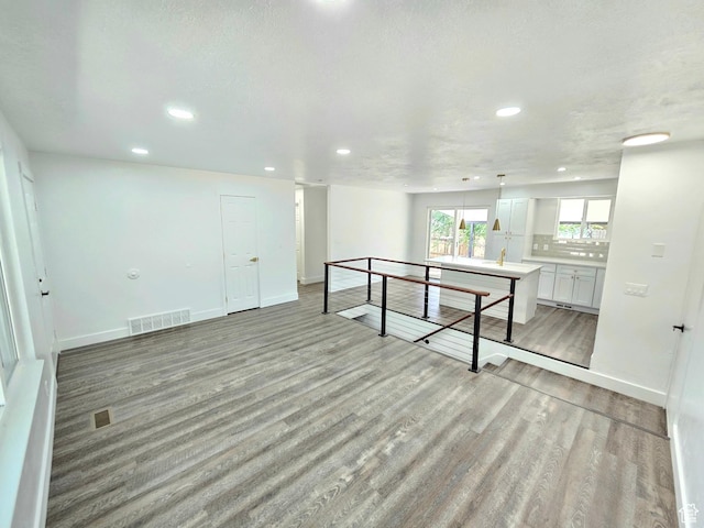 3797 S Armoridge Dr, Magna, UT 84044 - spare room featuring recessed lighting and light wood-style flooring
