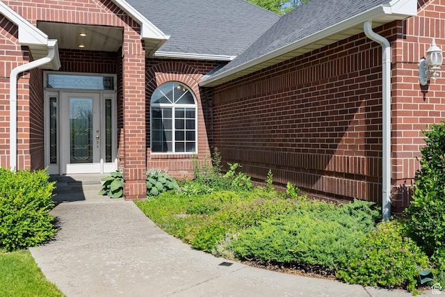 831 N Brookside Dr, Preston, ID 83263 - entrance to property featuring a shingled roof and brick siding