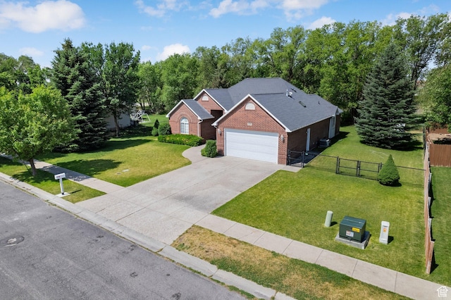 831 N Brookside Dr, Preston, ID 83263 - view of front of property with brick siding, driveway, and an attached garage