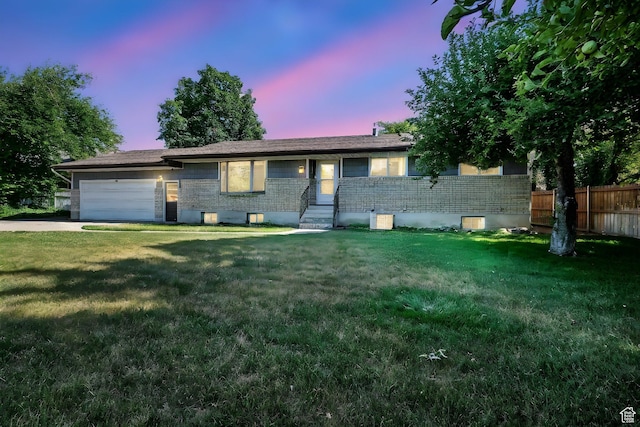 434 River Heights Blvd, River Heights, UT 84321 - single story home with brick siding, a garage, and concrete driveway