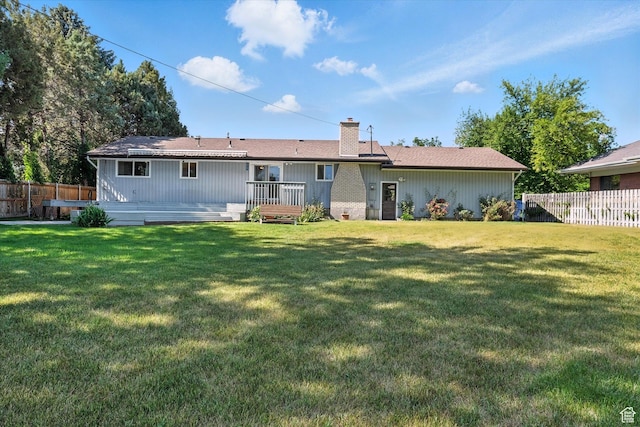 434 River Heights Blvd, River Heights, UT 84321 - back of property featuring a chimney and a deck