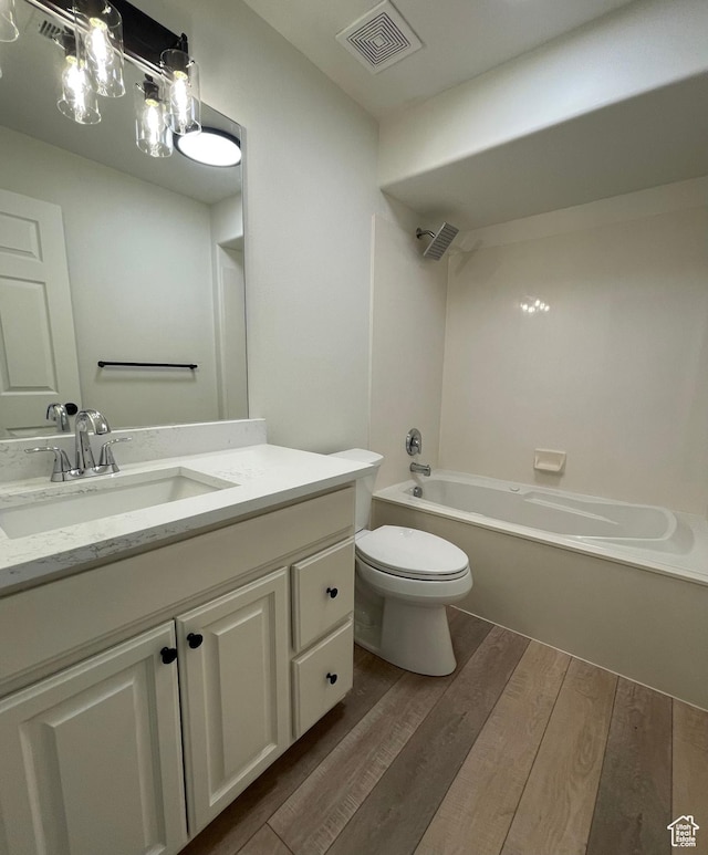 8176 N Cedar Springs Rd Unit V3, Eagle Mountain, UT 84005 - bathroom featuring vanity, wood finished floors, and  shower combination