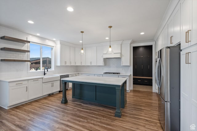 1401 W 1930 N, Pleasant Grove, UT 84062 - kitchen featuring appliances with stainless steel finishes, tasteful backsplash, white cabinetry, light countertops, and recessed lighting