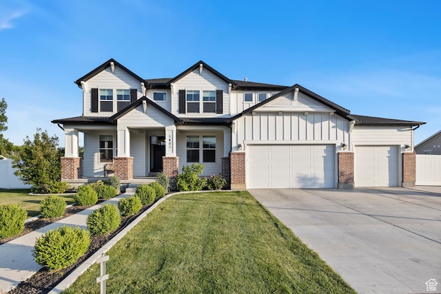 1401 W 1930 N, Pleasant Grove, UT 84062 - view of front facade with a garage, brick siding, concrete driveway, and board and batten siding