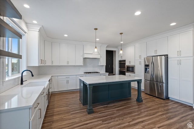 1401 W 1930 N, Pleasant Grove, UT 84062 - kitchen featuring appliances with stainless steel finishes, a center island, tasteful backsplash, dark wood finished floors, and white cabinets