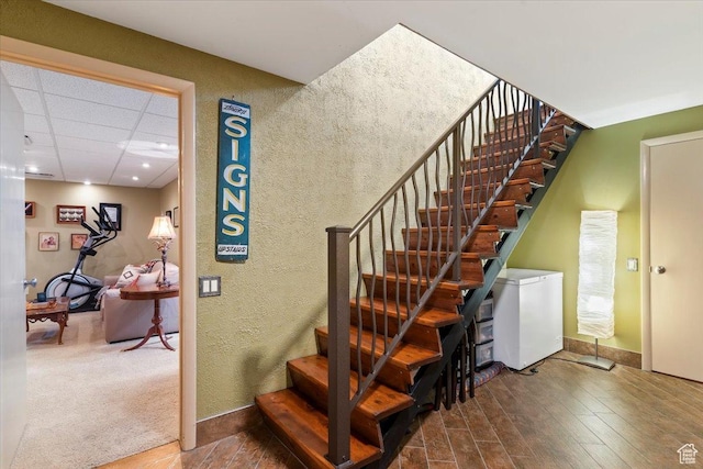 4420 Parkview Dr, Ogden, UT 84403 - staircase with wood finished floors and a textured wall