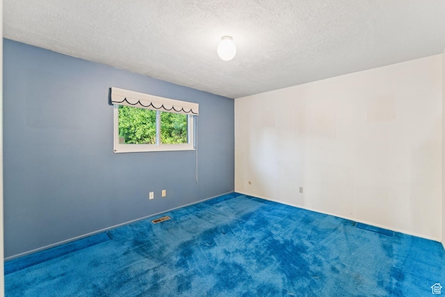 3327 S Crestwood Dr, Salt Lake City, UT 84109 - empty room featuring carpet floors and a textured ceiling