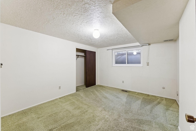 3327 S Crestwood Dr, Salt Lake City, UT 84109 - unfurnished bedroom with carpet flooring, a textured ceiling, and a closet
