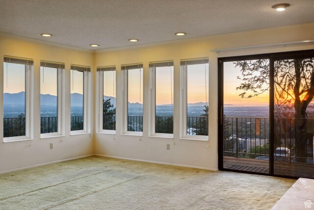 3327 S Crestwood Dr, Salt Lake City, UT 84109 - unfurnished room featuring carpet floors, a textured ceiling, ornamental molding, and recessed lighting