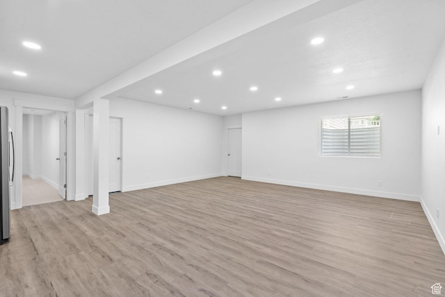 11571 S Skyward Rd W, South Jordan, UT 84009 - basement featuring recessed lighting, light wood finished floors, and freestanding refrigerator