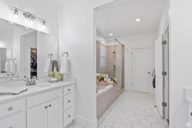 11571 S Skyward Rd W, South Jordan, UT 84009 - full bathroom featuring a stall shower, vanity, a garden tub, tile patterned floors, and recessed lighting