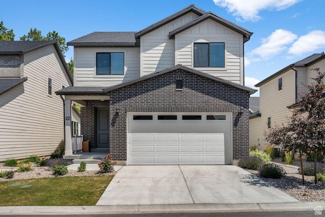 22 W Orchard Ln Unit 202, Bountiful, UT 84010 - view of front of home featuring driveway and brick siding