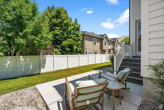 22 W Orchard Ln Unit 202, Bountiful, UT 84010 - view of patio with a residential view