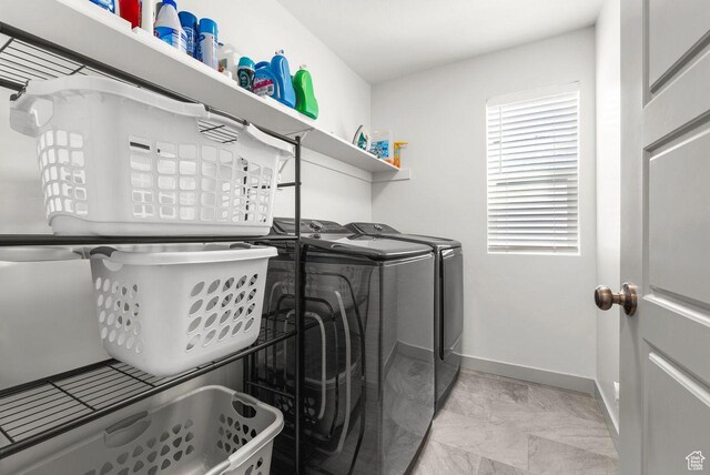 22 W Orchard Ln Unit 202, Bountiful, UT 84010 - laundry room with separate washer and dryer and baseboards