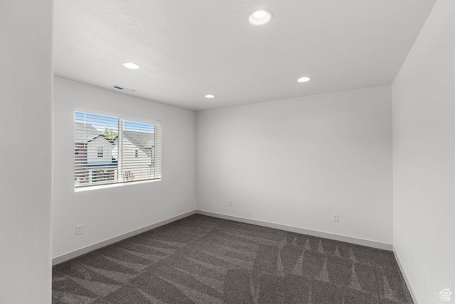22 W Orchard Ln Unit 202, Bountiful, UT 84010 - spare room with dark carpet and recessed lighting