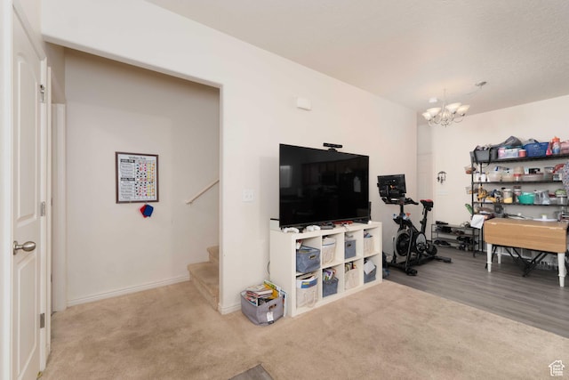 392 E 700 S Unit H, Vernal, UT 84078 - living area with a chandelier, stairway, and carpet