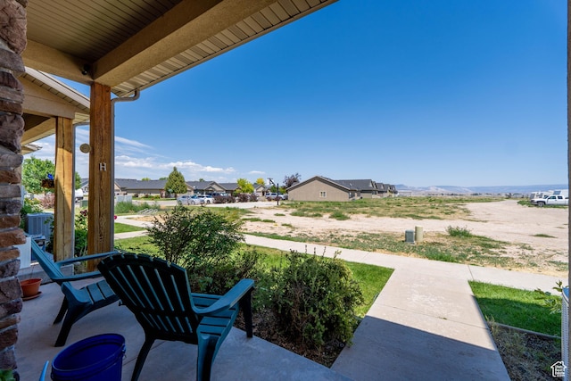 392 E 700 S Unit H, Vernal, UT 84078 - covered porch featuring a residential view