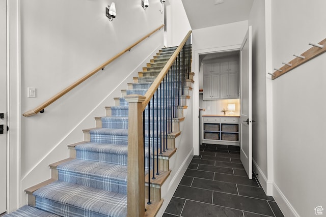 926 E Autumn Dr, Brian Head, UT 84719 - stairs with tile patterned flooring and baseboards