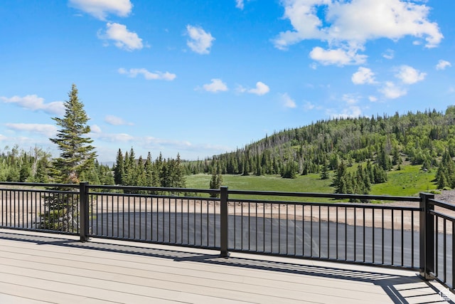 926 E Autumn Dr, Brian Head, UT 84719 - wooden terrace featuring a wooded view
