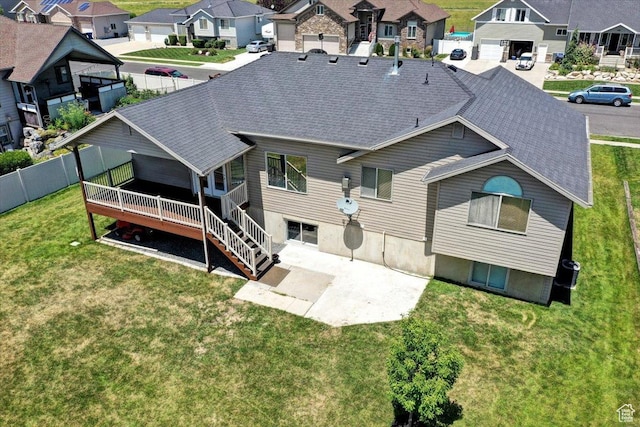 4595 W 1650 N, West Point, UT 84015 - rear view of property with a residential view, a shingled roof, a patio area, and a deck
