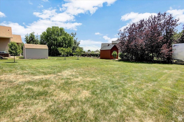 4595 W 1650 N, West Point, UT 84015 - view of green lawn with a storage unit
