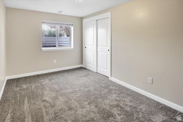 4595 W 1650 N, West Point, UT 84015 - unfurnished bedroom with carpet floors and a closet