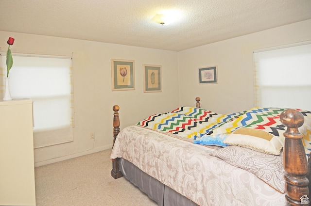 1160 E 12th St S, Ogden, UT 84404 - carpeted bedroom featuring a textured ceiling