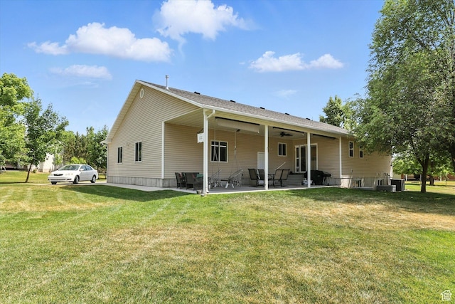 85 S 300 W, Smithfield, UT 84335 - rear view of property featuring a patio area, a lawn, and ceiling fan