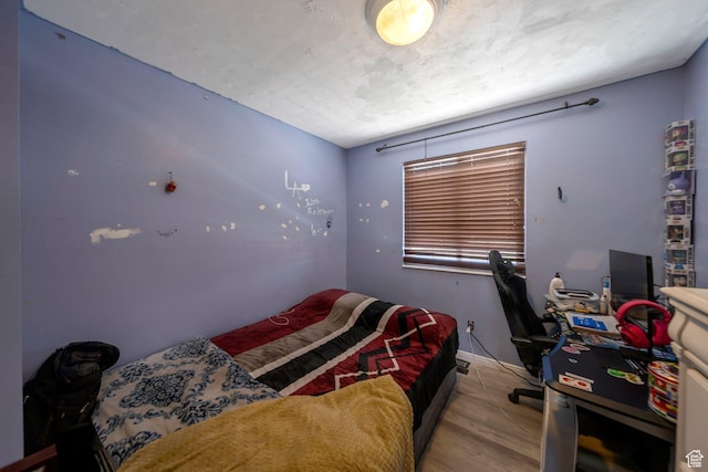 6231 S Westbrook Dr W, Taylorsville, UT 84129 - bedroom with baseboards and wood finished floors