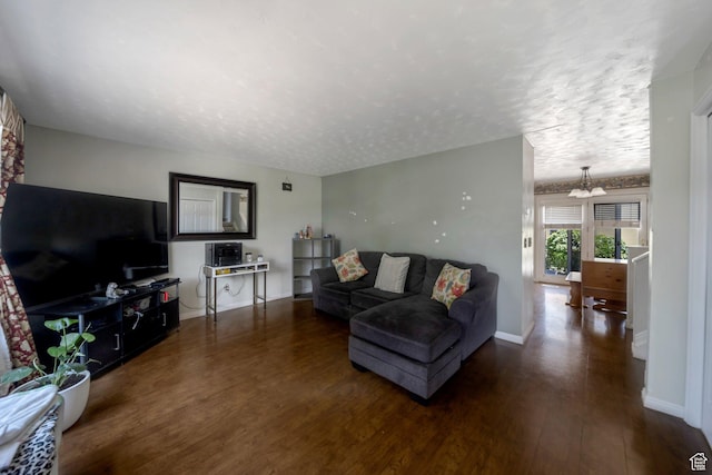 6231 S Westbrook Dr W, Taylorsville, UT 84129 - living area with wood finished floors, a chandelier, and a textured ceiling